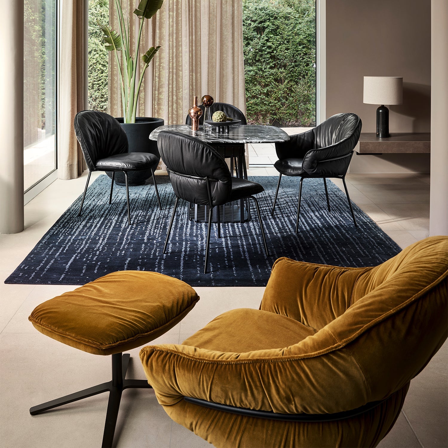 freifrau | marie lounge chair | x-base with rocker + tilting mechanism | adamo + eva tabacco + deep black frame